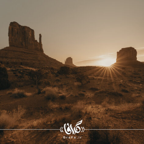 تصویر استوک خورشید و کوه در بیابان